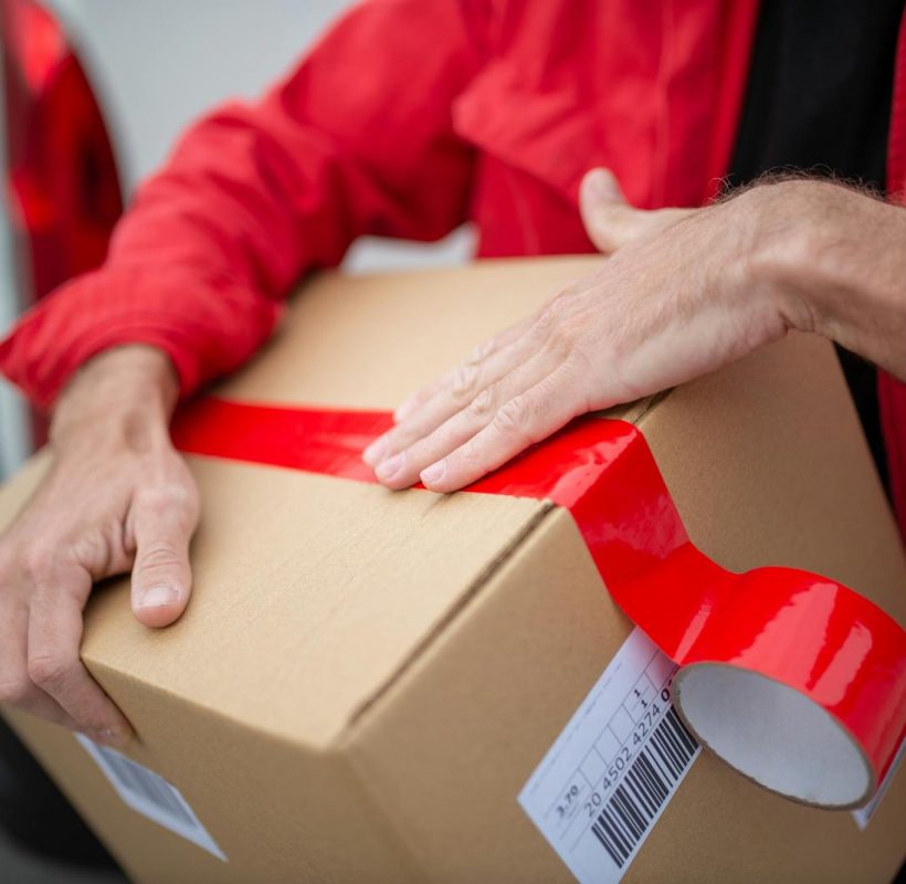 A Person Carrying a Box